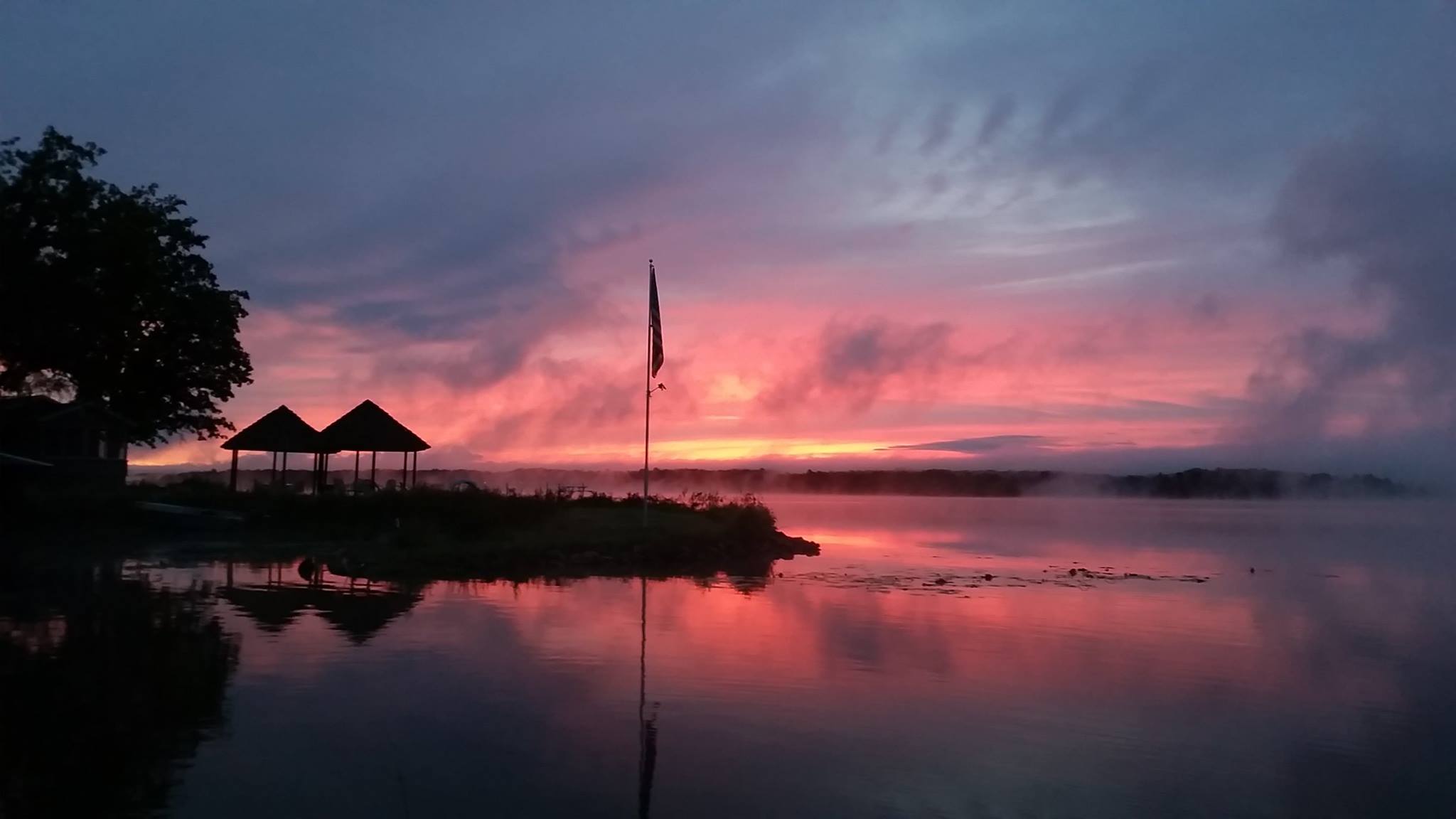 Dusk light over the resort dock and Lake Chetac